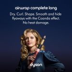 ⁦مصفف الشعر الطويل متعدد الاستخدامات من دايسون إصدار خاص Airwrap™ باللون البرونزي الفراولة والوردي الخوخي مع مشط لفك التشابك⁩ - الصورة ⁦2⁩