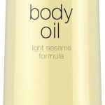 نيوتريجينا زيت الجسم بتركيبة السمسم الخفيفة، مرطب للبشرة الجافة وزيت تدليك الجسم المرطب، للحصول على توهج مشع وصحي، زيت استحمام مغذي للرطوبة الشفافة، 8.5 اونصة سائلة