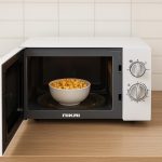 ⁦فرن ميكروويف 700 واط 30 لتر من نيكاي، مزود بمؤقت ووظائف اذابة الثلج، تصميم مضغوط، NMO3010M (ابيض)⁩ - الصورة ⁦4⁩