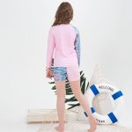 ⁦طقم ملابس سباحة للبنات مكون من قطعتين للحماية من الطفح الجلدي لعمر 4-14 سنة بعامل حماية من الاشعة فوق البنفسجية 50+ باكمام طويلة⁩ - الصورة ⁦6⁩