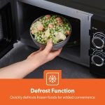 ⁦جيباس ميكروويف يدوي سولو 700 واط | فرن ميكروويف سولو 20 لتر مع 5 مستويات طاقة | اعادة تسخين، وظيفة اذابة الثلج التلقائي ومؤقت 30 دقيقة | 2 قرص دوار، سهل التنظيف | تصميم صغير انيق⁩ - الصورة ⁦7⁩