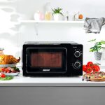 ⁦جيباس ميكروويف يدوي سولو 700 واط | فرن ميكروويف سولو 20 لتر مع 5 مستويات طاقة | اعادة تسخين، وظيفة اذابة الثلج التلقائي ومؤقت 30 دقيقة | 2 قرص دوار، سهل التنظيف | تصميم صغير انيق⁩ - الصورة ⁦2⁩