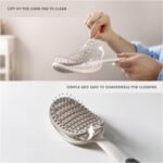 ⁦فرشاة شعر ذاتية التنظيف من لوفاكا، فرشاة فك تشابك منحنية بفتحات تهوية مع ازالة الشعر بنقرة واحدة، سهلة التنظيف، تجفيف أسرع للشعر الرطب والجاف، للاستخدام للنساء والرجال والاطفال (ابيض)⁩ - الصورة ⁦2⁩